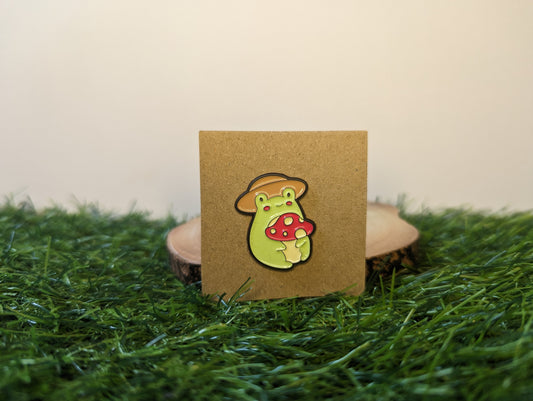 Frog Wearing A Hat Holding A Mushroom Pin